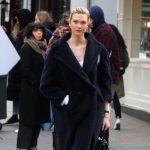 Karlie Kloss wears a navy Max Mara teddy coat. Celebrity winter coats. teddy bear coat